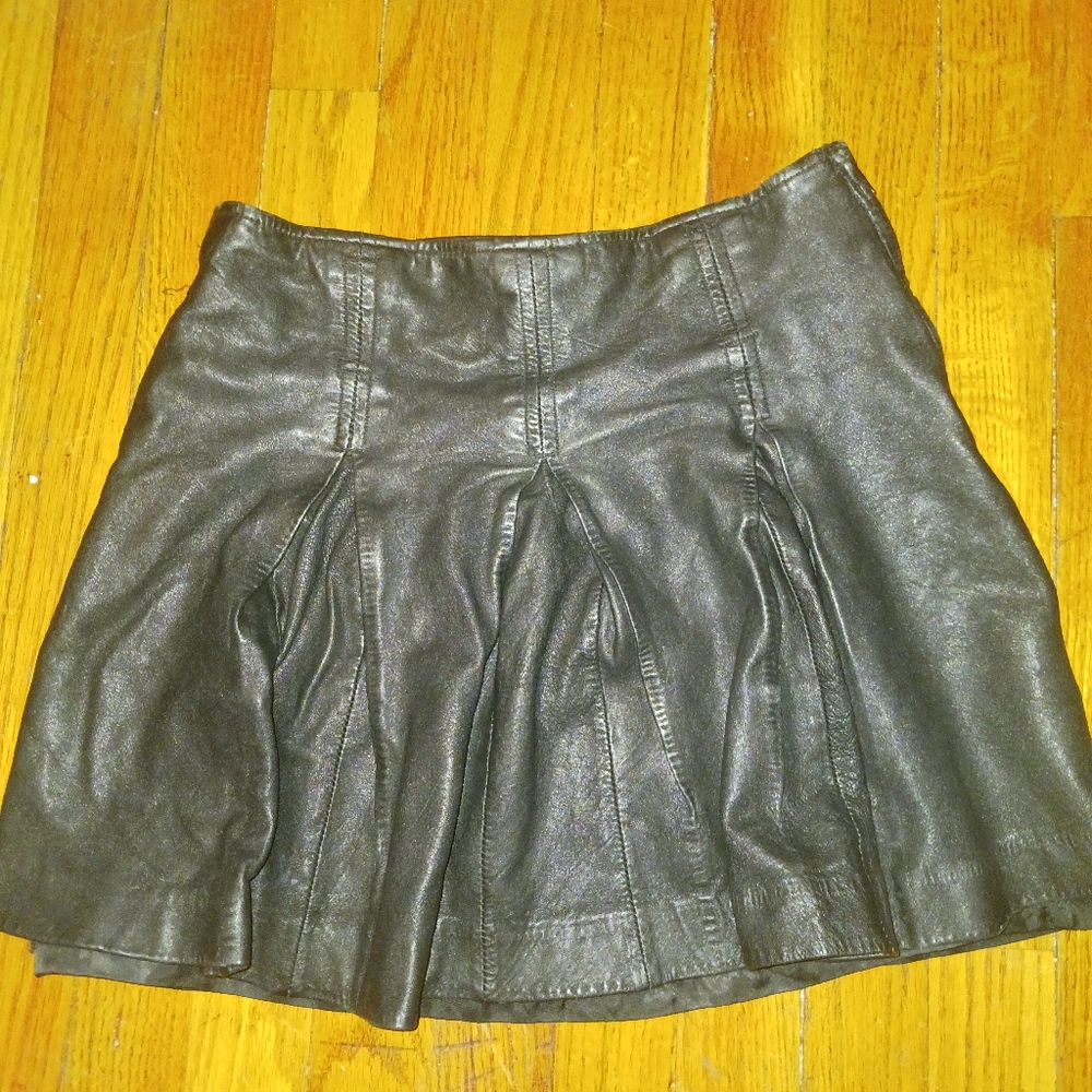 Mini cheerleader style leather skirt